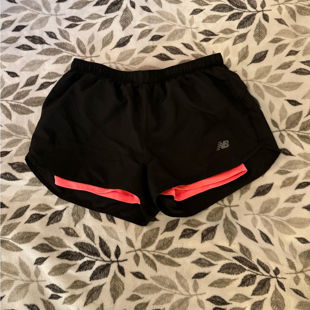 New Balance running short